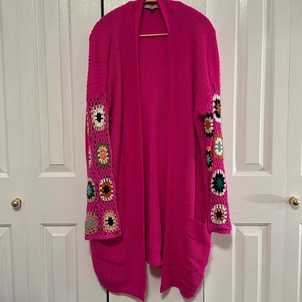 Rounded shoulder hot pink crotchet sleeve cardigan